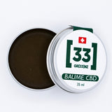 Photo du baume au CBD bio GR33NZ, conçu à partir de chanvre cultivé en agriculture biologique. Produit naturel pour le soin et la détente quotidienne.