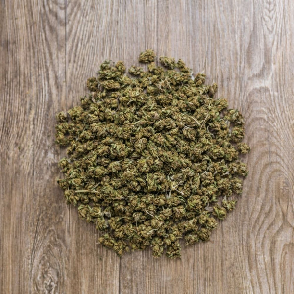 Fleurs CBD 100g Blueberry Muffin en vue aérienne. Têtes homogènes et séchées, issues de chanvre conforme aux normes européennes.